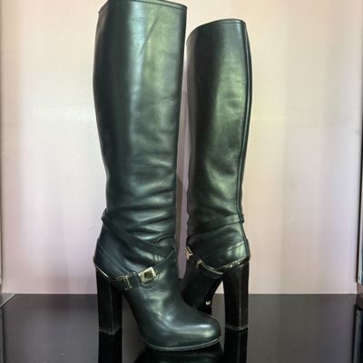 Paire de bottes DIOR P.36,5 cuir noir et métal doré, talon 1…