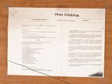 a piece of paper on a table with a picture of jean chapin