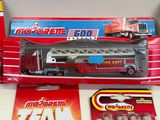 a red fire truck and other toys on a table