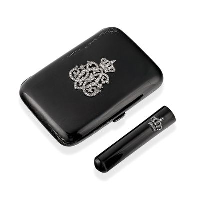 an image of a black cigarette case with a cigarette in it