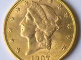 gros plan d'une pièce de monnaie sur laquelle figure une tête de femme
