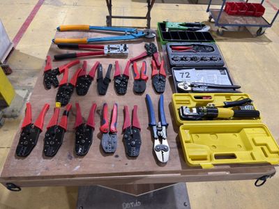 a table with many tools on it in the room