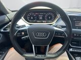 the interior of a car with a steering wheel and dashboard controls
