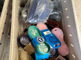 a box full of hairbrushes and other items in it