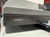 a printer that is sitting on top of a desk