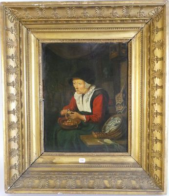 une peinture à l'huile représentant une femme tenant un panier, dans un cadre doré