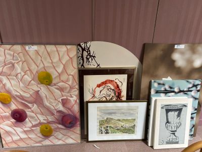 a table with a bunch of art on it