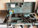 a tool in a case that is sitting on a table