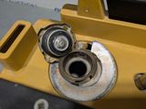 a close up of a machine that has a couple of nuts on it