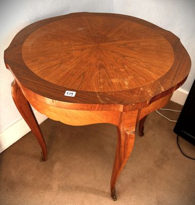 a wooden table with a wooden top on a carpeted floor