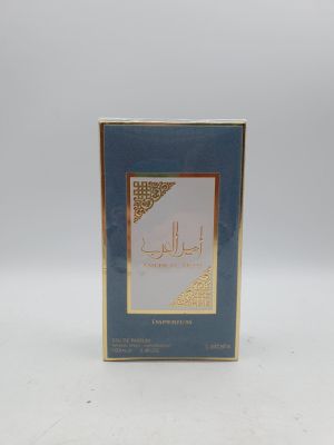 an image of a box of perfume sitting on top of a white surface
