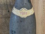 a bottle of wine that is sitting on a table