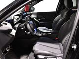 the interior of a car with black leather seats and a blue dash board
