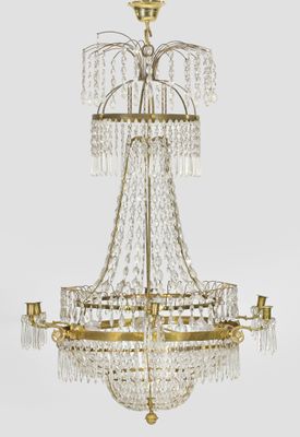 a large brass and crystal chandelier