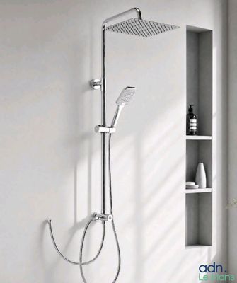 a close up of a shower head with a shower head and hand shower