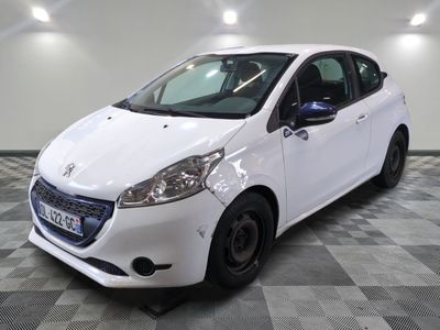 the small white car is parked on a checkered floor