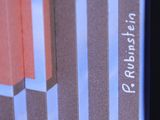 a close up of a book with a picture of a building on it