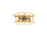 an image of a close up of a gold broochle on a white background