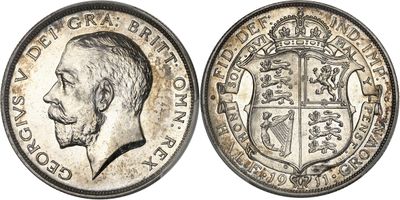 a close up of a coin with a crown on it
