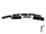 many different types of video game controllers on a white surface