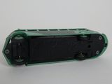 a close up of a green and black device