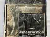 a black and white photo of a poster on a wall