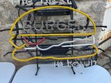 a table with a bunch of wires attached to it