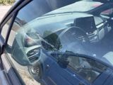 a reflection of a car in the rear window of a car