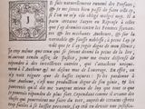 an open book with a picture of a woman on it
