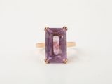 an image of a ring with an amethorate stone in it