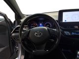 the interior of a car with a steering wheel, dashboard, and dash board