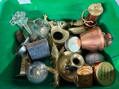 a green bin full of various items that are in it