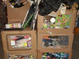 a stack of cardboard boxes with various items on them