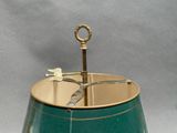 an image of a green vase with a bird on it