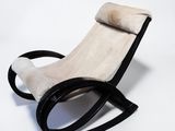 an image of a black and white rocking chair on a white background