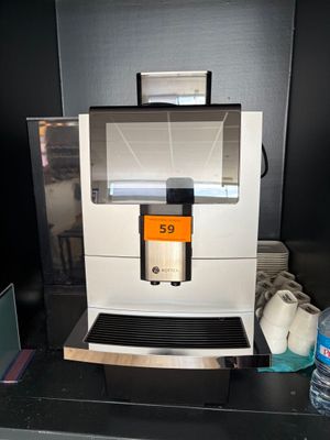 a coffee machine that is sitting on a counter