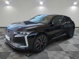 a black 2021 infiniti suv parked on a checkered floor