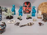 many figurines of different shapes and sizes on the table