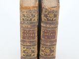 two old books sitting on top of each other
