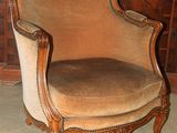 a chair that is sitting in the corner of a room