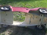 a toy car that is sitting on top of a cart