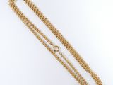 a gold chain with a clasp on it
