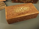 a wooden box that has a design on the inside of it