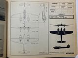 an open book with a drawing of a plane and a diagram of a plane