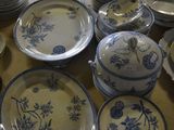 a table with a lot of plates and bowls on it