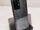 the back of a black samsung s9 phone with a charging dock