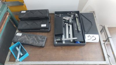 a lot of tools that are sitting on a table