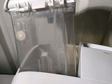 a close up of a toilet with the lid up