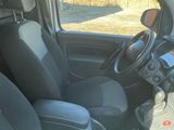 the interior of a car with a steering wheel and a dashboard