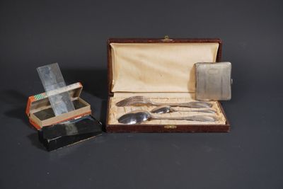a silverware set in a case with a knife and spoon in it